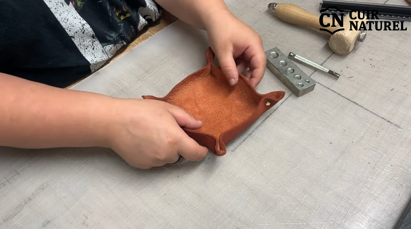 Setting rivets on a leather valet tray